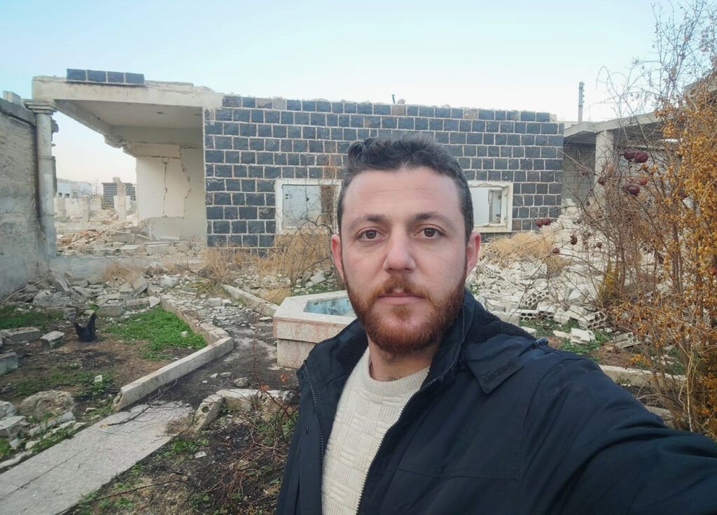 Nazih visits his destroyed home in Aleppo.